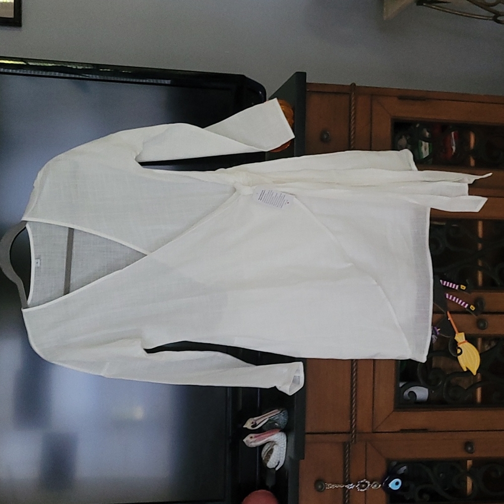 White long sleeve long shirt or short dress with wrap around look with tie. New
